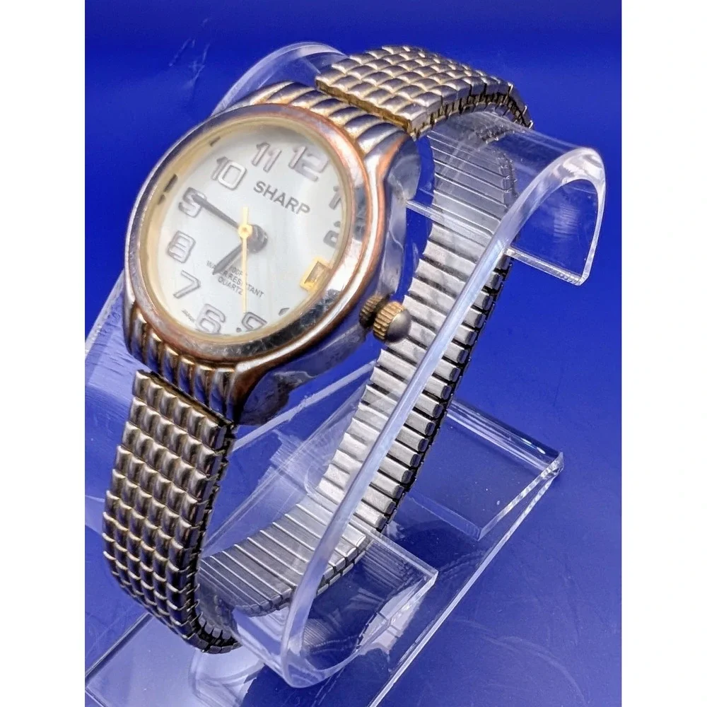 Sharp Ladies Watch Date Gold tone Stretch Band 5105 Vintage‎ New Batterry